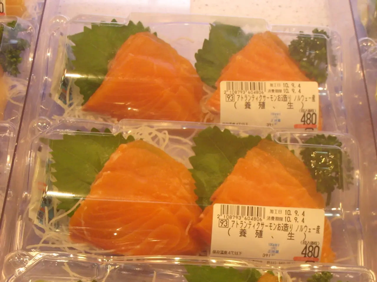 In this image we can see there are slices of fish packed in a plastic bag.