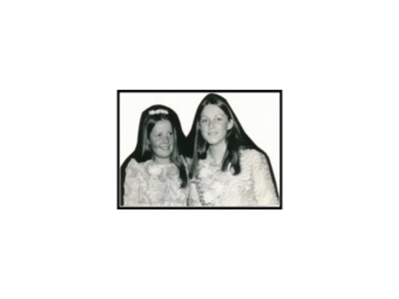 In this image we can see the black and white photography. In the photograph there are women.