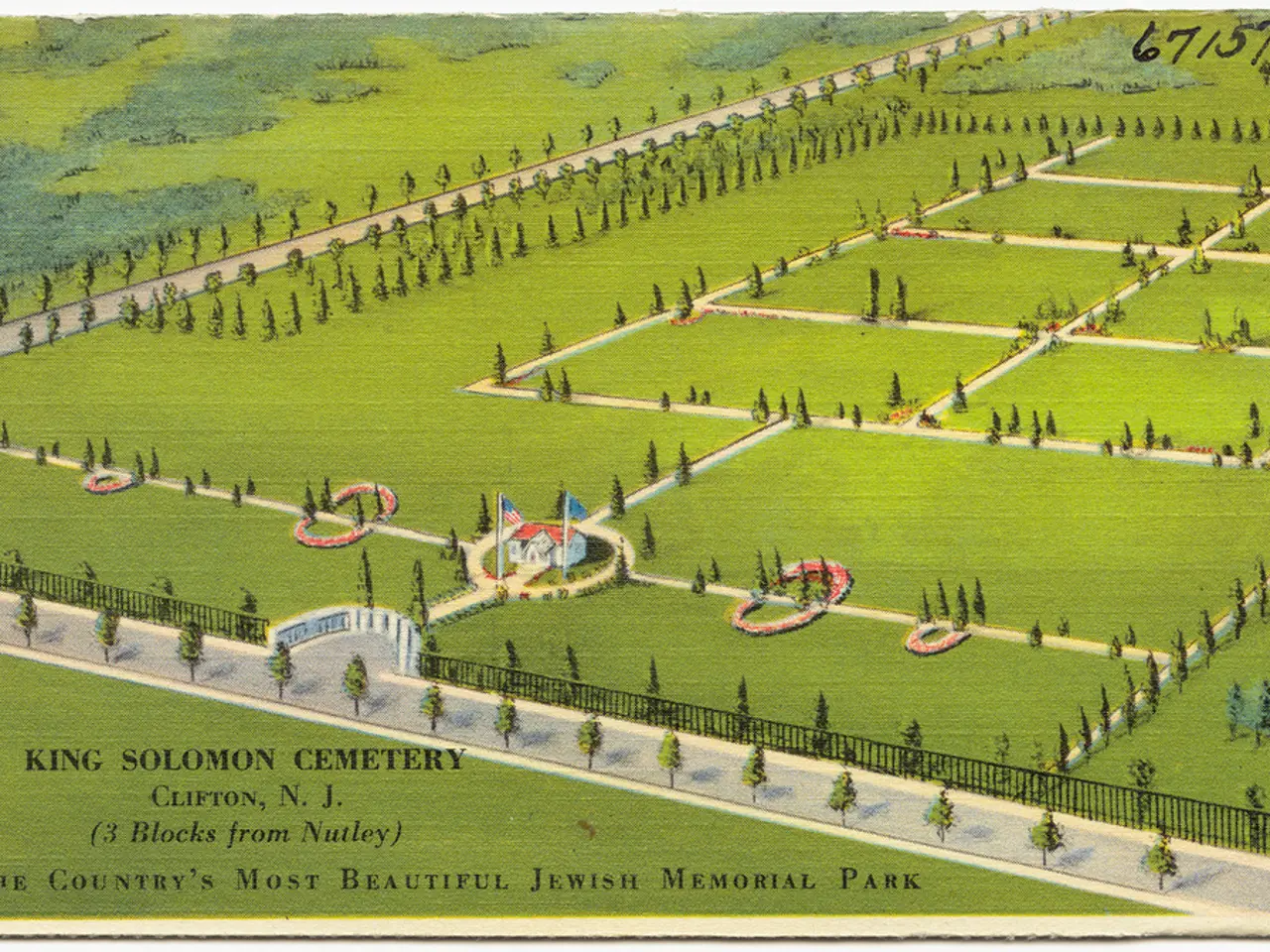 In this picture we can see a house, flags, trees, grass and fence. Something written on this...