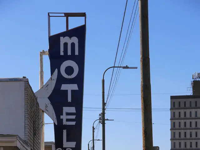 This picture might be taken from outside of the city and it is sunny. In this image, on the left...