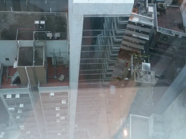 As we can see in the image there are buildings and windows.