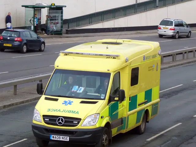 In this image I see the road on which there are 3 vehicles and I see persons who are sitting in...