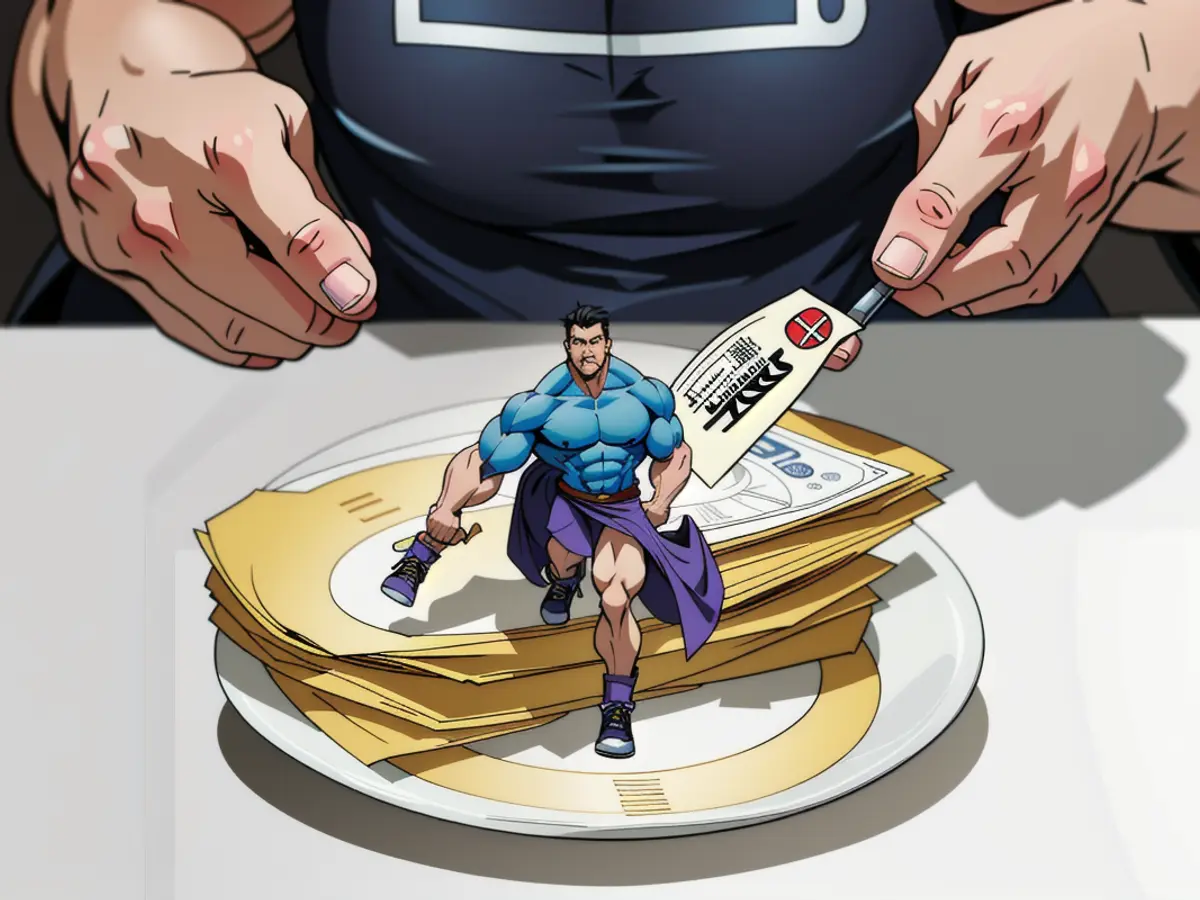 Individual dividing a bundle of hundred-dollar notes into two equal parts.